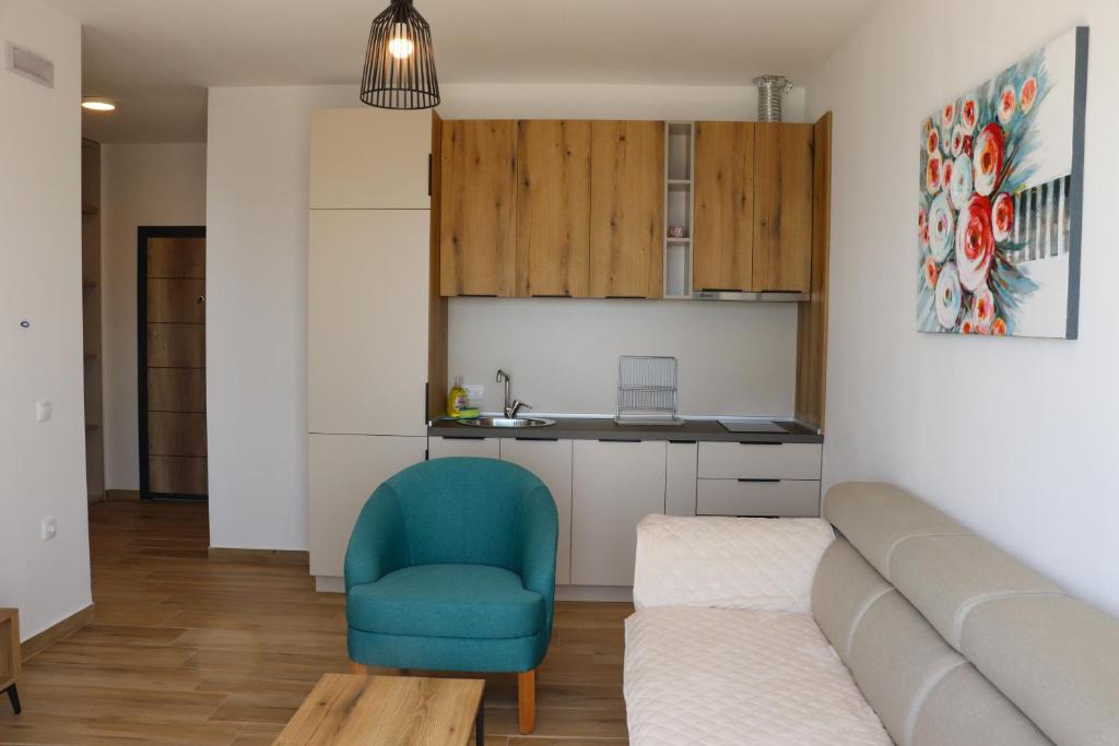 Kuchyň nebo kuchyňský kout v ubytování Eagles Apartments & Suites