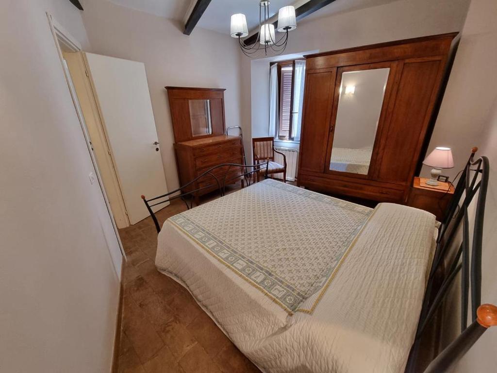 Postel nebo postele na pokoji v ubytování La Porticina a Nocera Umbra