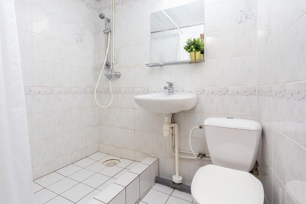 Koupelna v ubytování Hotel Dzingel