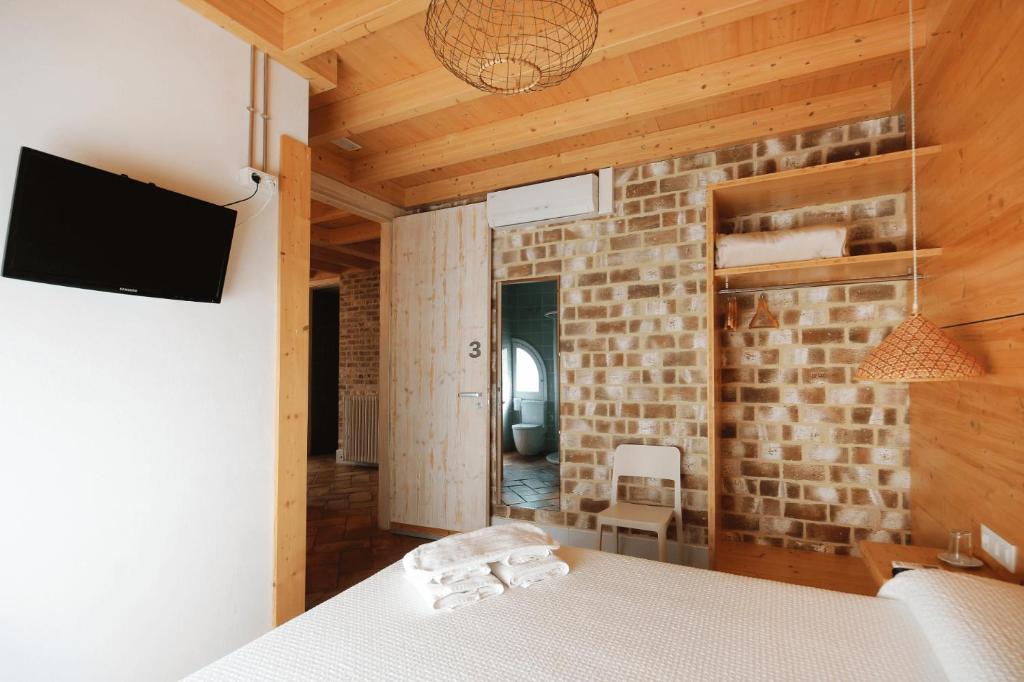 TV a/nebo společenská místnost v ubytování B&B Sant Pol - Adults Only