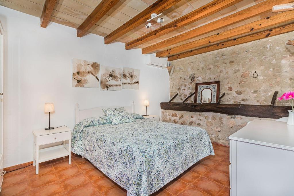 Postel nebo postele na pokoji v ubytování Can De L'ausina