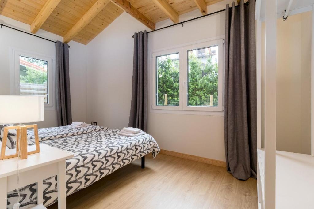 Postel nebo postele na pokoji v ubytování Apartamentos El Bosque De Cubas