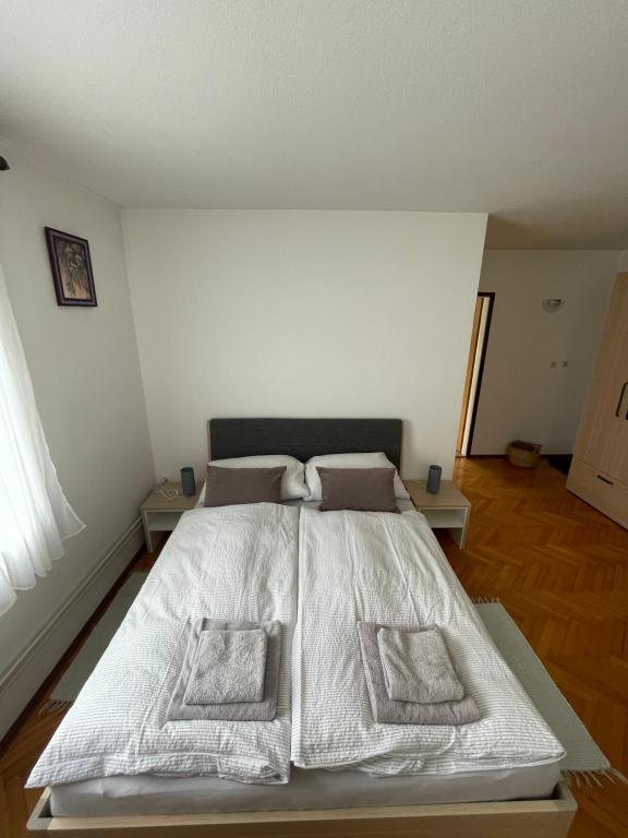 Postel nebo postele na pokoji v ubytování Homestay J&M