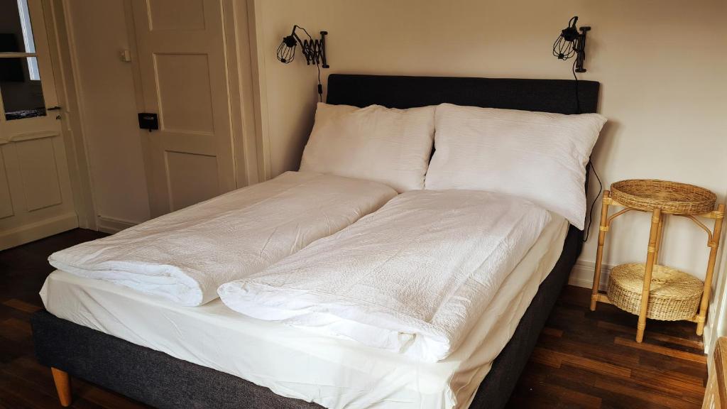 Postel nebo postele na pokoji v ubytování Swiss Holiday Apartments