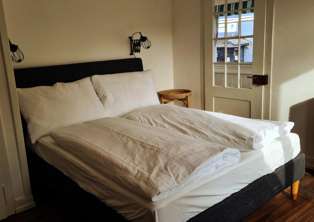 Postel nebo postele na pokoji v ubytování Swiss Holiday Apartments
