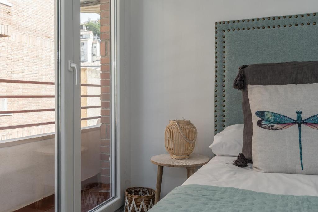 Postel nebo postele na pokoji v ubytování tuGuest Gran Vía 24 Apartment