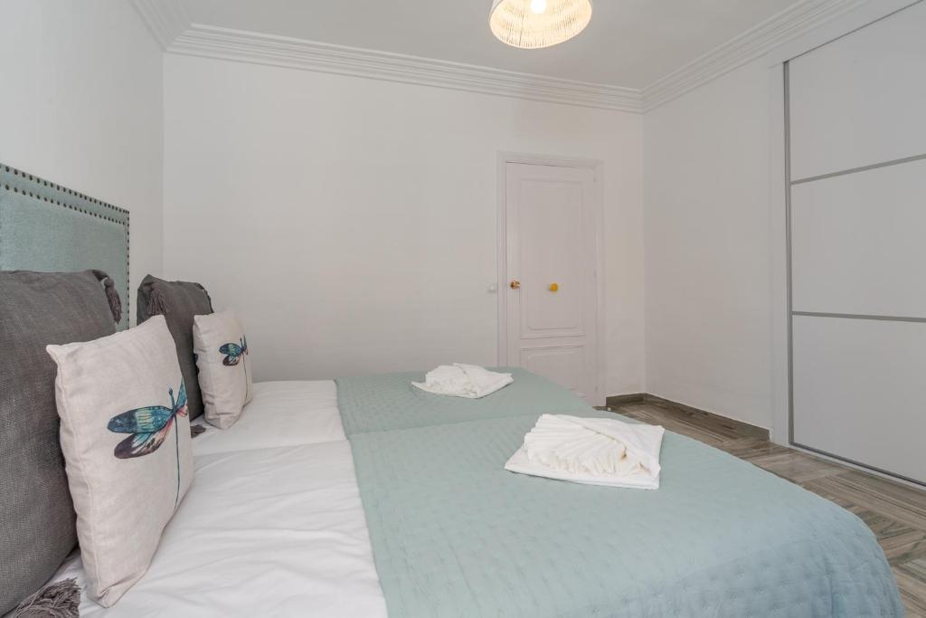 Postel nebo postele na pokoji v ubytování tuGuest Gran Vía 24 Apartment