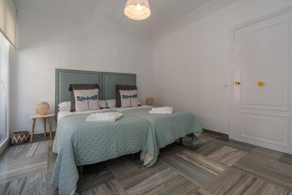 Postel nebo postele na pokoji v ubytování tuGuest Gran Vía 24 Apartment