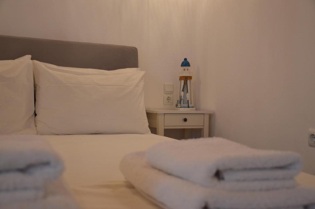 Postel nebo postele na pokoji v ubytování Cute Studio in Milos