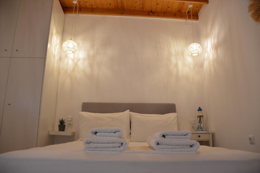 Postel nebo postele na pokoji v ubytování Cute Studio in Milos