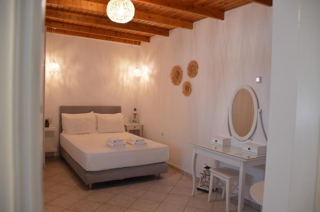 Postel nebo postele na pokoji v ubytování Cute Studio in Milos