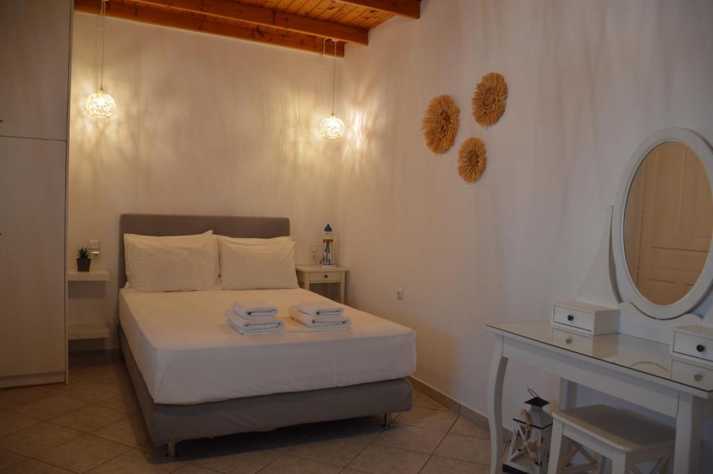 Postel nebo postele na pokoji v ubytování Cute Studio in Milos