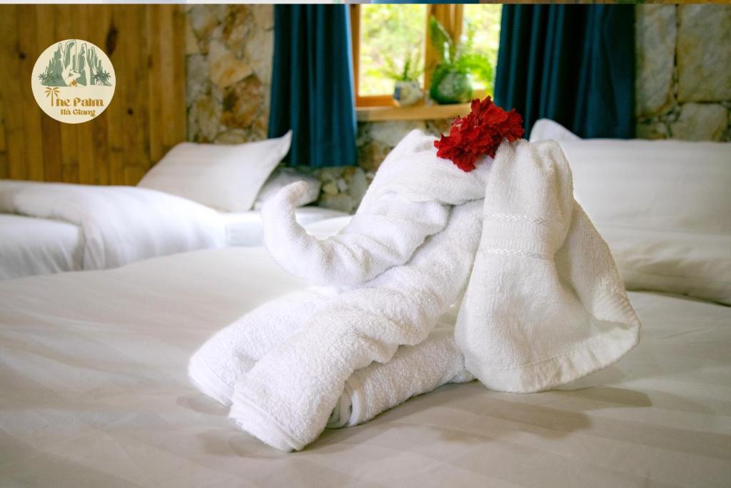 Postel nebo postele na pokoji v ubytování TVpalm Ecolodge