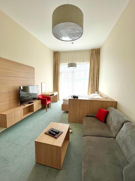 Posezení v ubytování Hotelový apartmán ALFRED C406