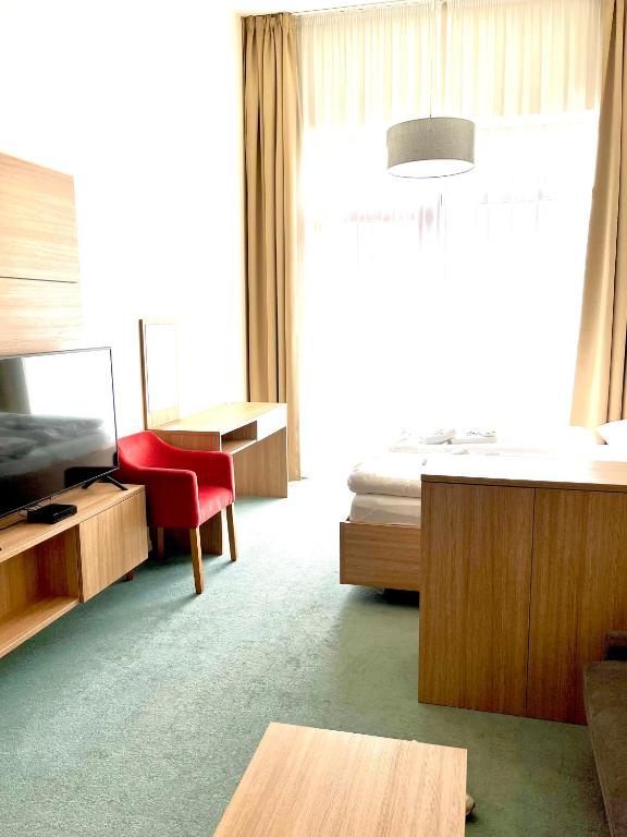 Posezení v ubytování Hotelový apartmán ALFRED C406