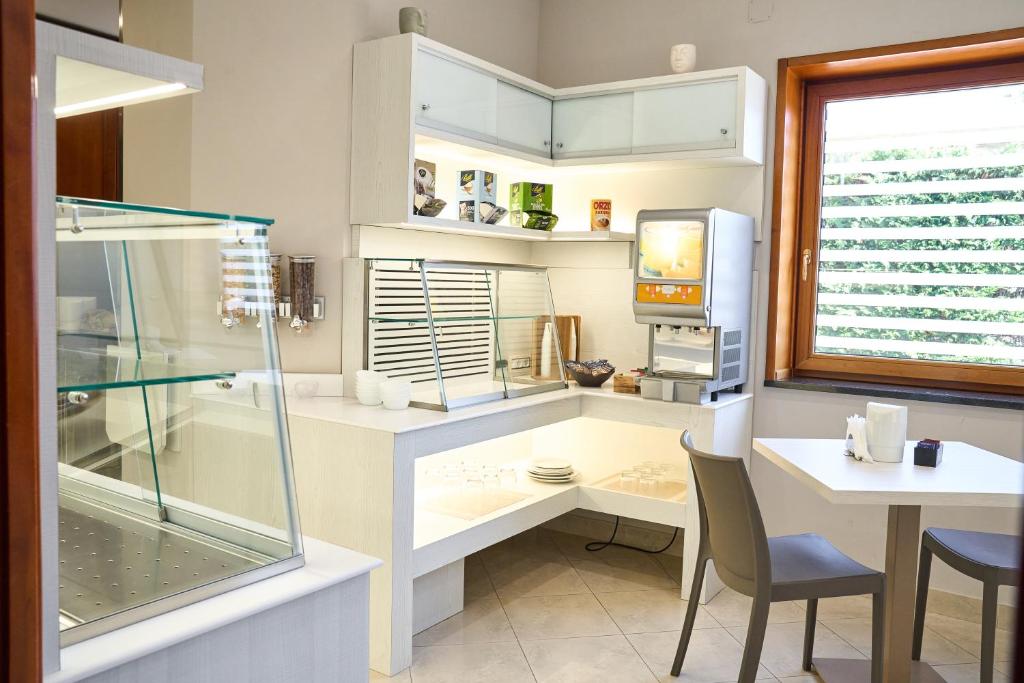 Kuchyň nebo kuchyňský kout v ubytování Hotel Miramare