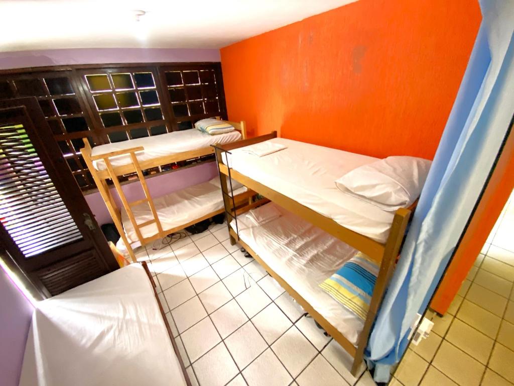 Postel nebo postele na pokoji v ubytování Parnaíba Hostel