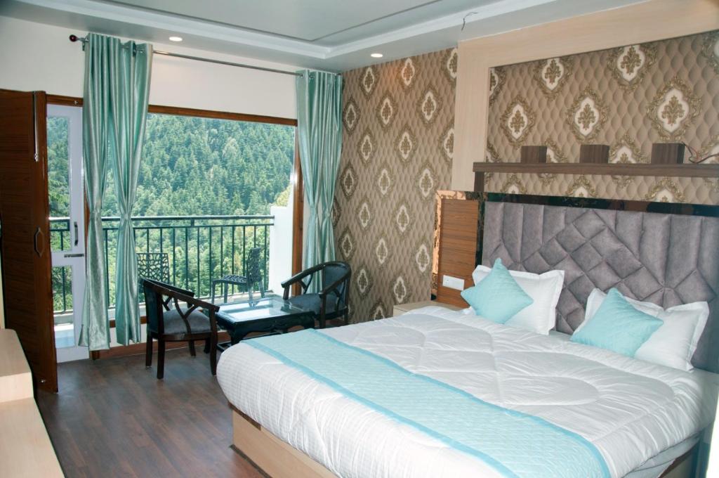 Postel nebo postele na pokoji v ubytování Summer Hill Resort