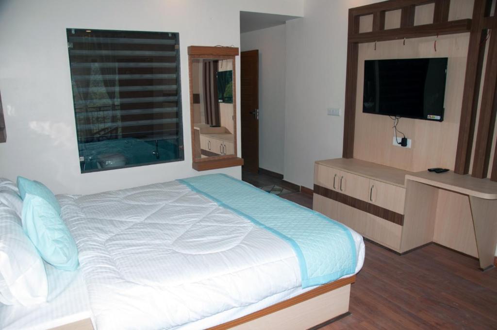 Postel nebo postele na pokoji v ubytování Summer Hill Resort