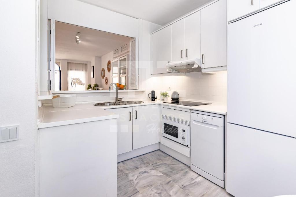 Kuchyň nebo kuchyňský kout v ubytování Marbella House 46 Duplex