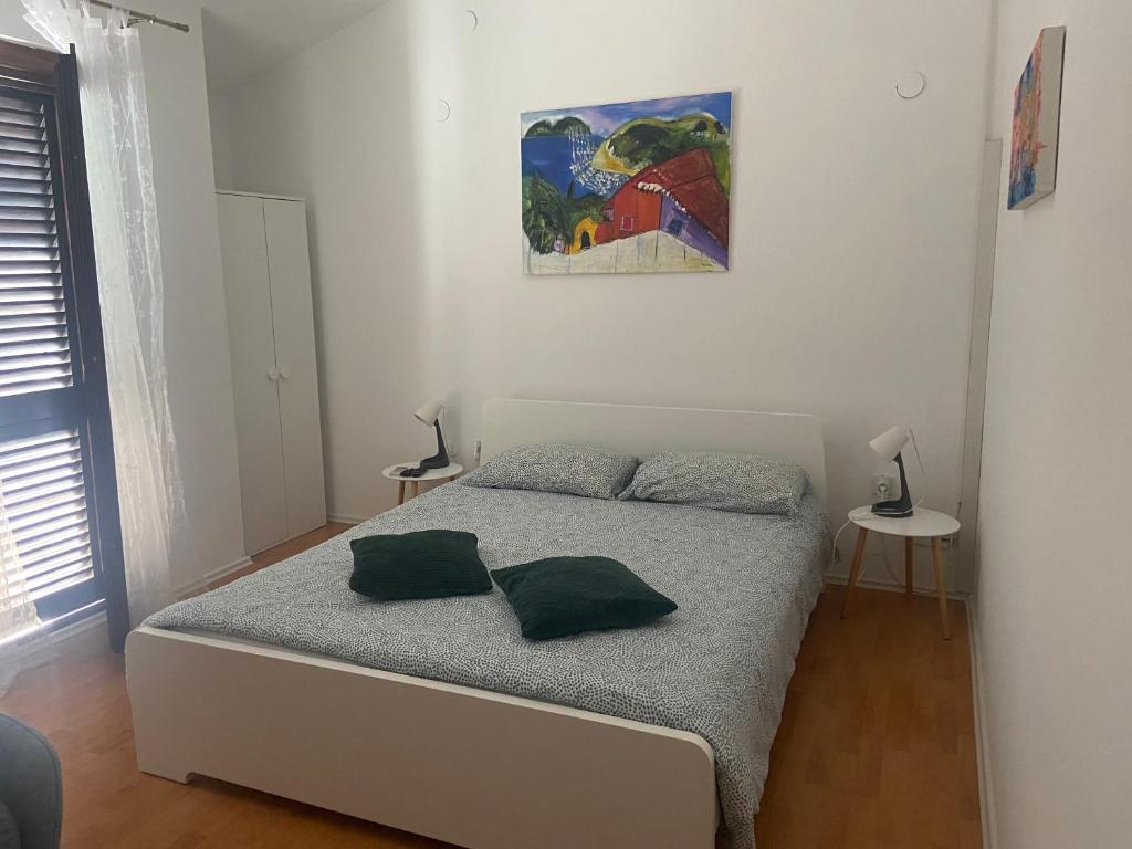 Posteľ alebo postele v izbe v ubytovaní Giorgio Funtana