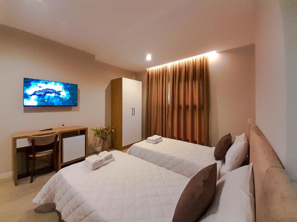 Postel nebo postele na pokoji v ubytování Solea Hotel