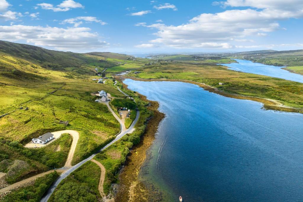 an aerial view of a river and a road at Cottage 439 - Clifden in Clifden