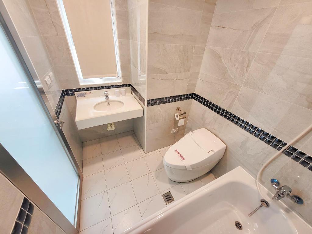 Koupelna v ubytování Gucheng International Hotel