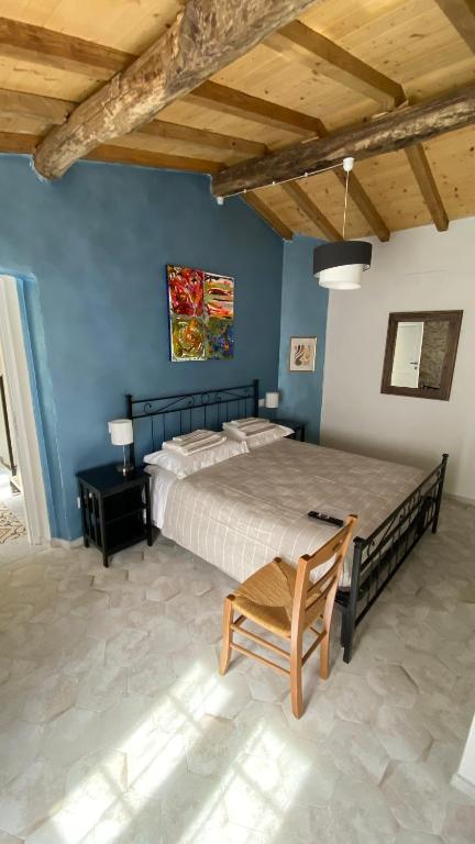 Ein Bett oder Betten in einem Zimmer der Unterkunft B&B Gronda Via Vandelli