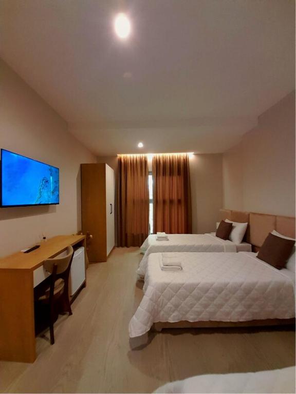Postel nebo postele na pokoji v ubytování Solea Hotel