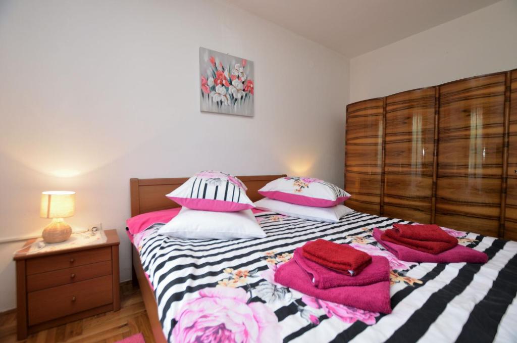 Postel nebo postele na pokoji v ubytování Rooms Tomc