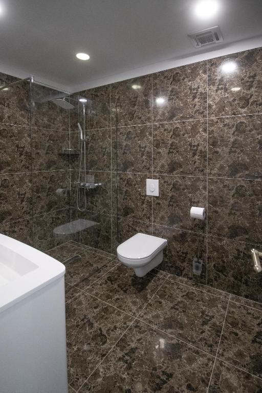 Koupelna v ubytování NBT Hotel Reps