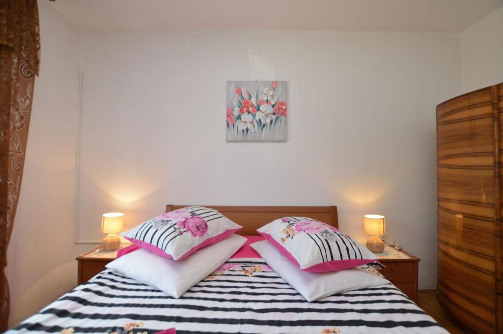 Postel nebo postele na pokoji v ubytování Rooms Tomc
