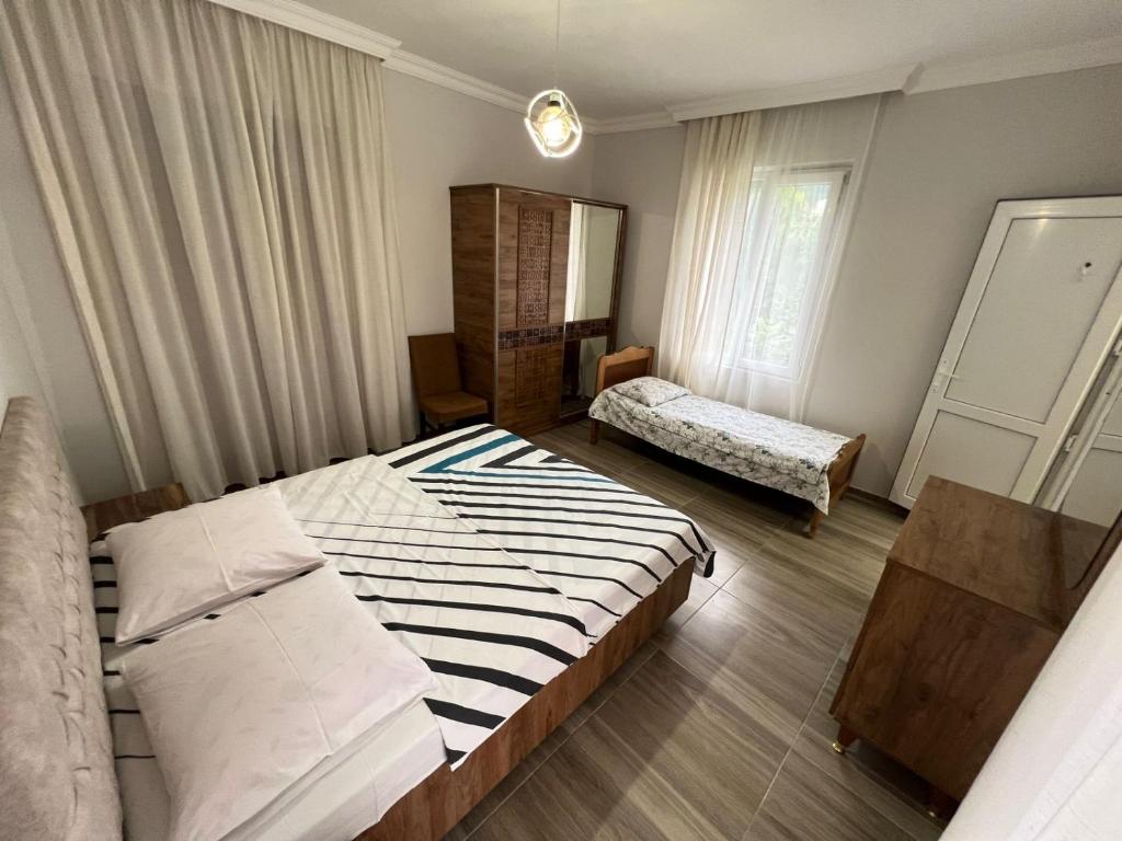 Postel nebo postele na pokoji v ubytování Guest House In Gonio