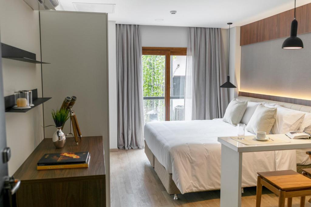Postel nebo postele na pokoji v ubytování Five Hotel & Residences