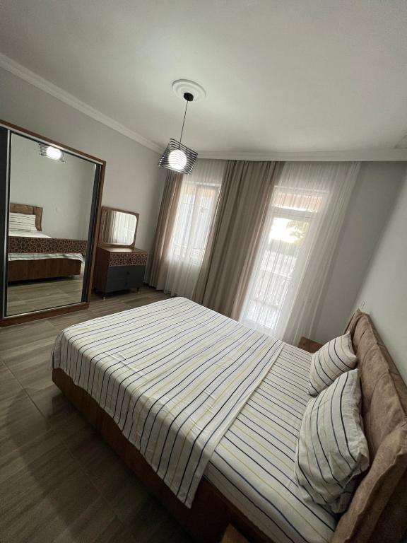 Postel nebo postele na pokoji v ubytování Guest House In Gonio