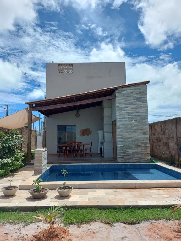 Casa con piscina y patio en casAmar Gostoso, en São Miguel do Gostoso