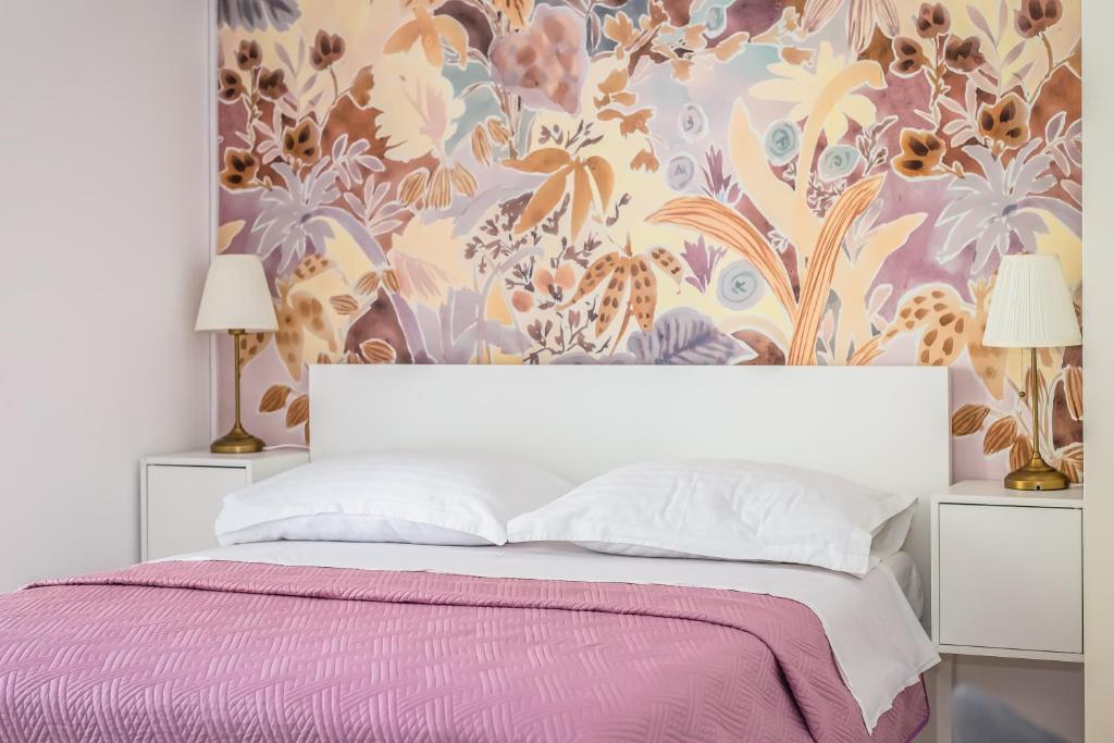 Postel nebo postele na pokoji v ubytování Apartments Agneza Tucepi