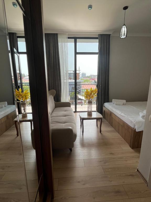 Postel nebo postele na pokoji v ubytování Cozy Rooms