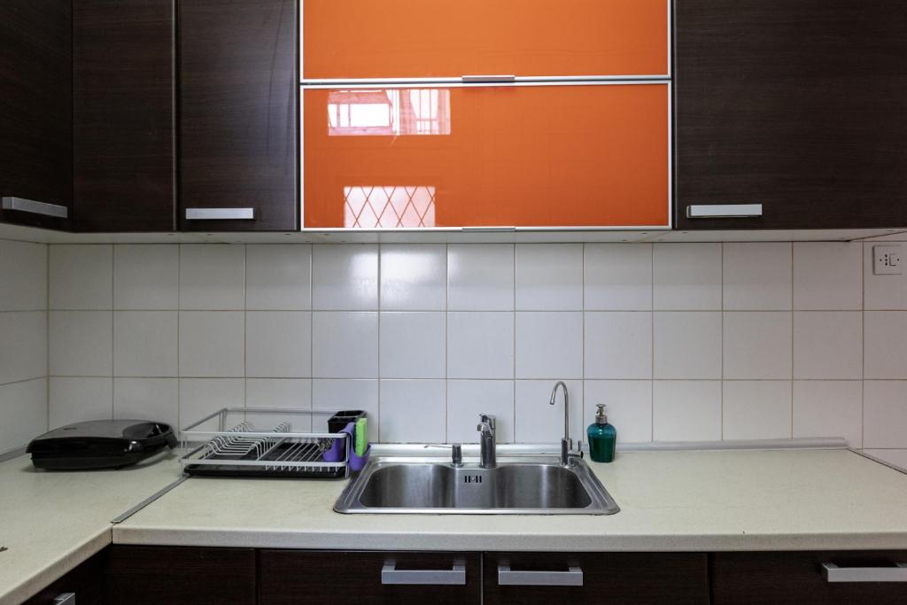 Kuchyň nebo kuchyňský kout v ubytování Classy spacious central appartment