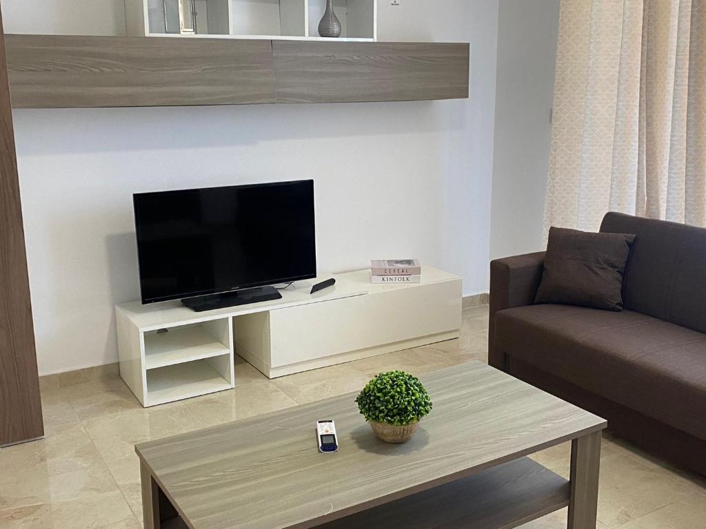TV a/nebo společenská místnost v ubytování Sunrise Court