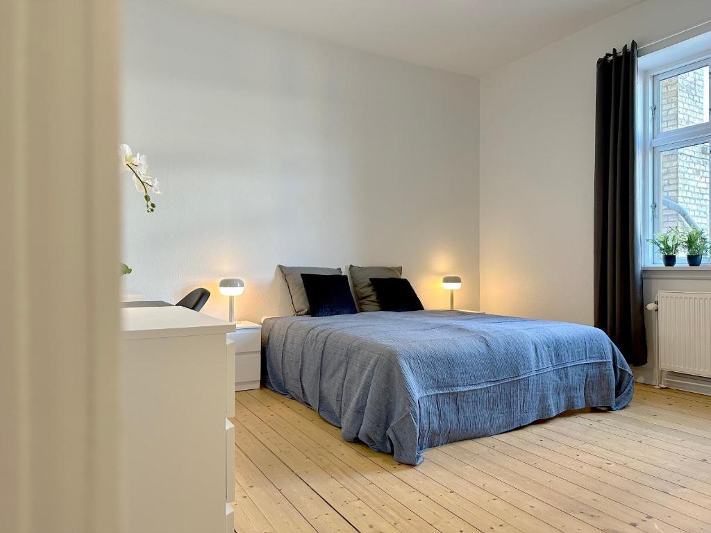 Postel nebo postele na pokoji v ubytování Nice Apartment With Free Street Parking