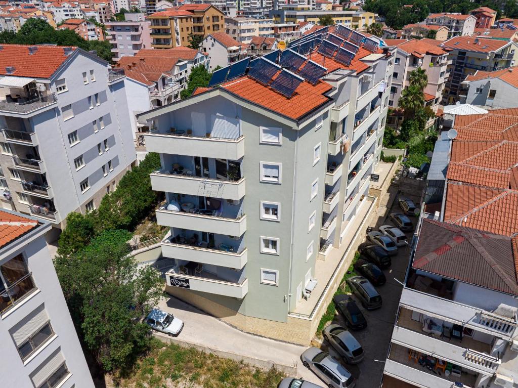 an overhead view of a building with a red roof at Marea Apartments Budva in Budva