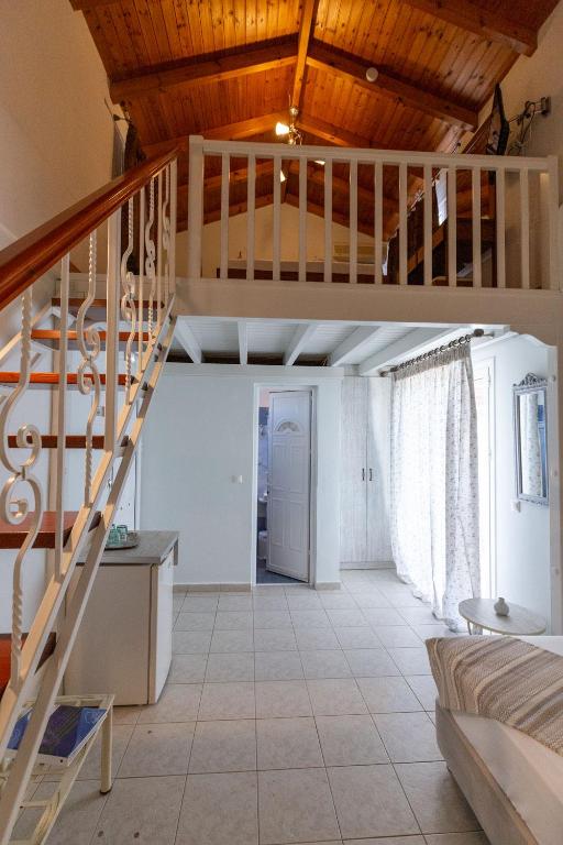 Postel nebo postele na pokoji v ubytování Voula Resort