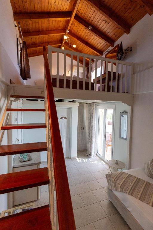 Postel nebo postele na pokoji v ubytování Voula Resort