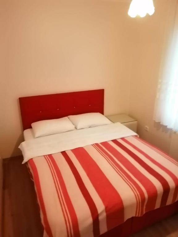 Кровать или кровати в номере SNOW HİLL HOUSE Pansiyon