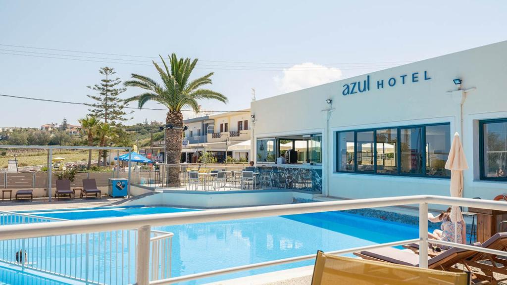 a hotel with a swimming pool and a resort at Azul Eco Hotel in Skaleta
