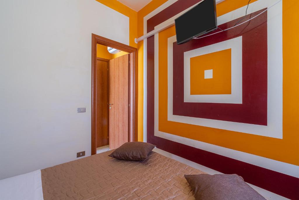 Telewizja i/lub zestaw kina domowego w obiekcie La casa Arancione