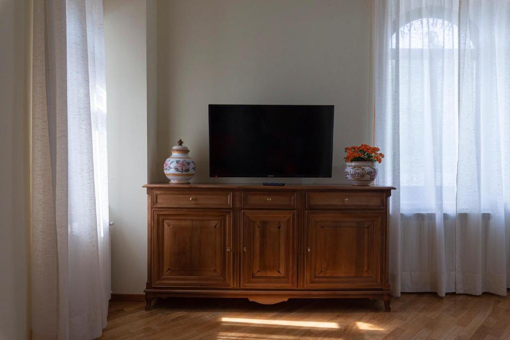 TV a/nebo společenská místnost v ubytování IBibiena - CASA CAMPALDINO