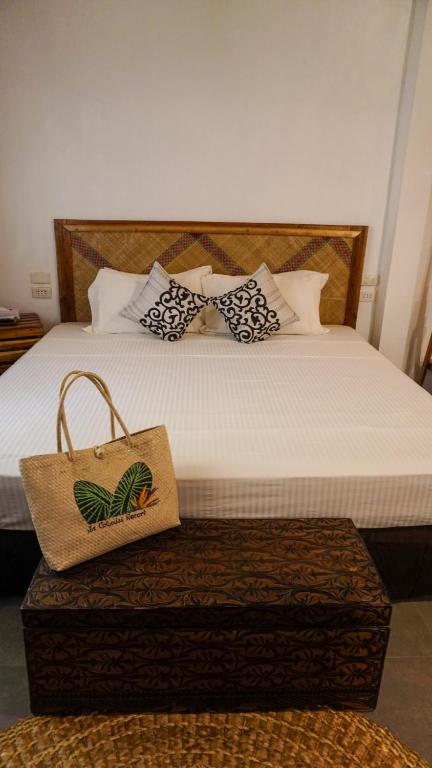 Postel nebo postele na pokoji v ubytování La Colonial Resort